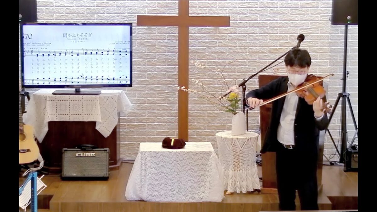 雨の雫に映るもの